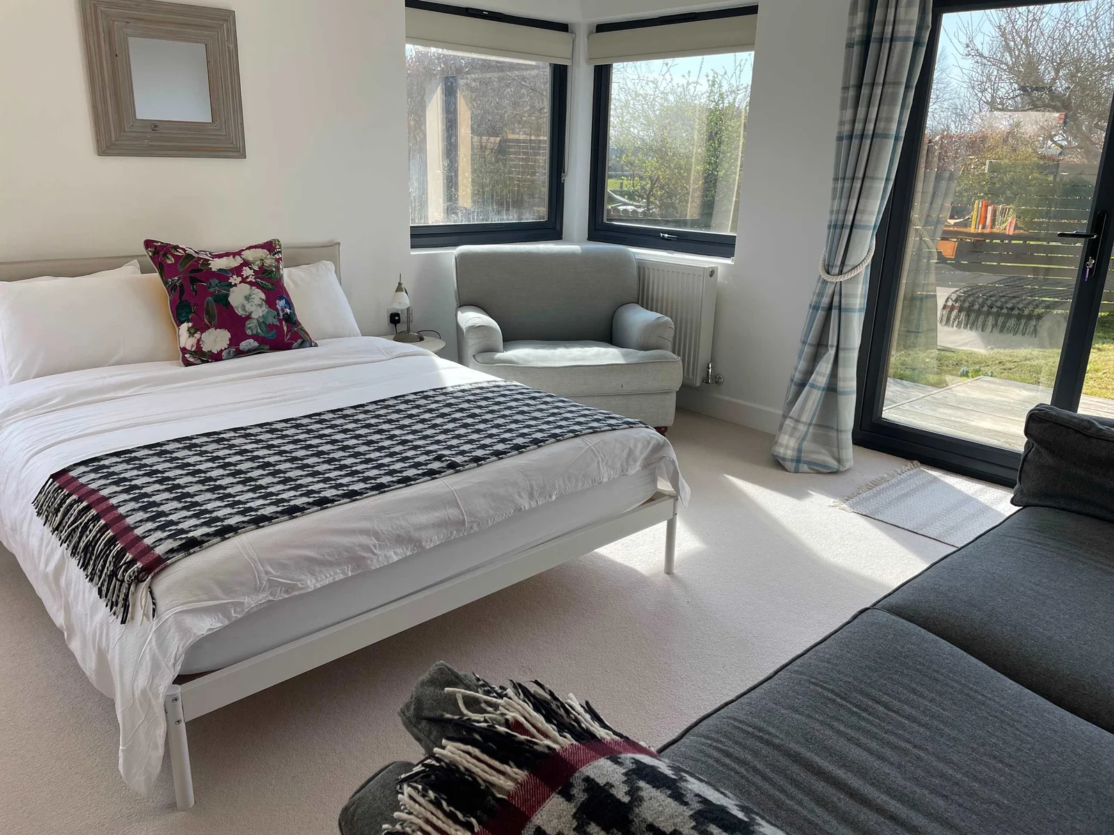 Take the weight of your feet in the king room with comfy bed, sofa and armchair.