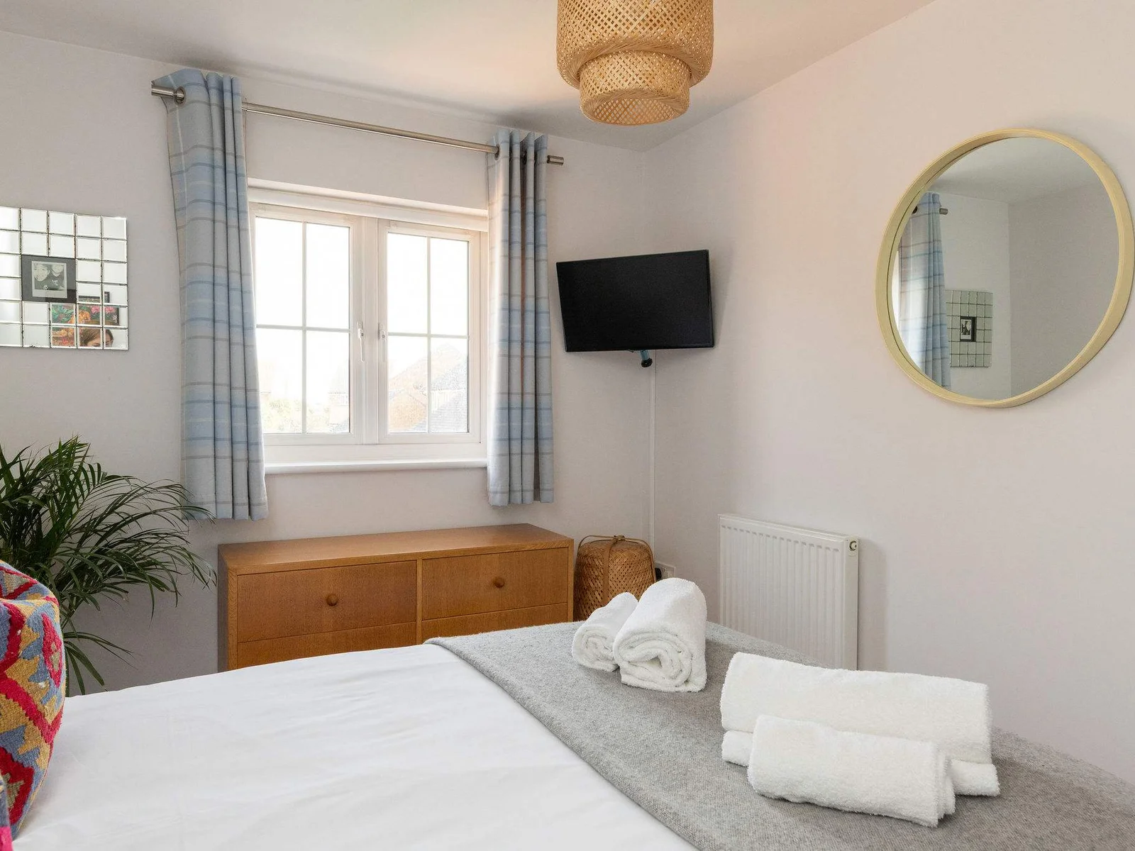 Relax in the bright and stylish bedroom.