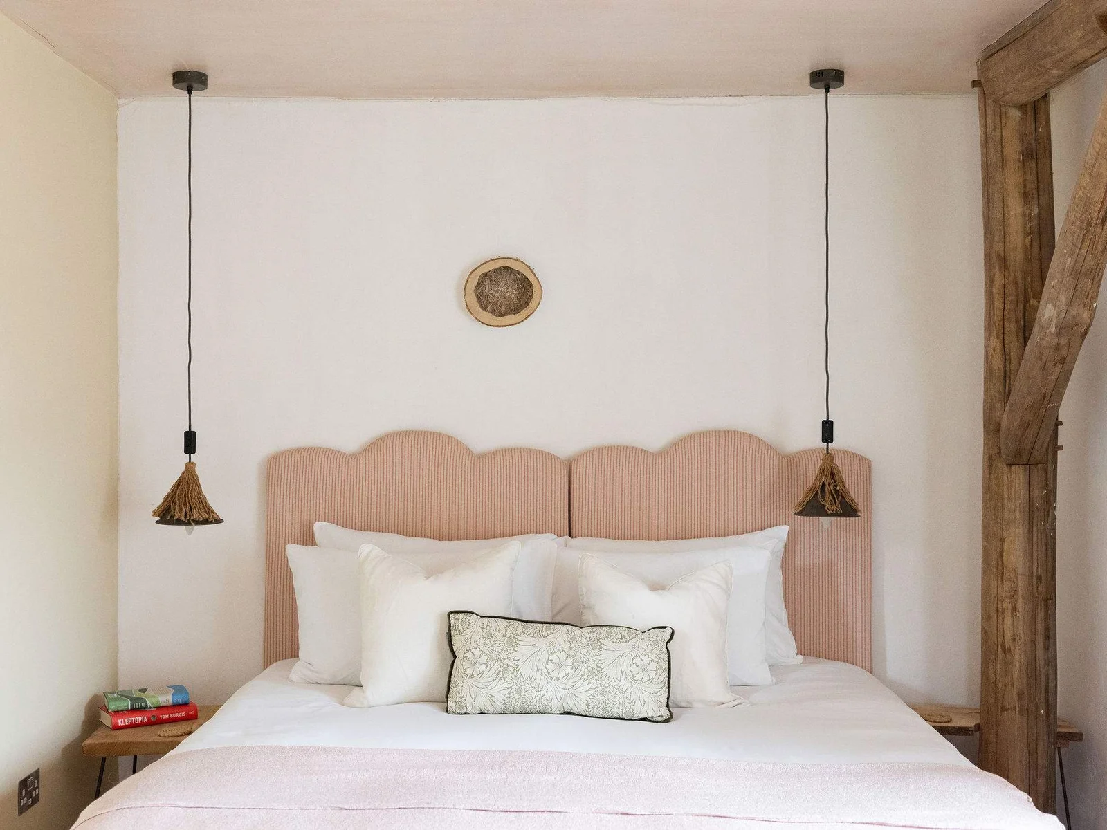 Beautifully styled with soft linens and rustic touches for a truly restful night's sleep.