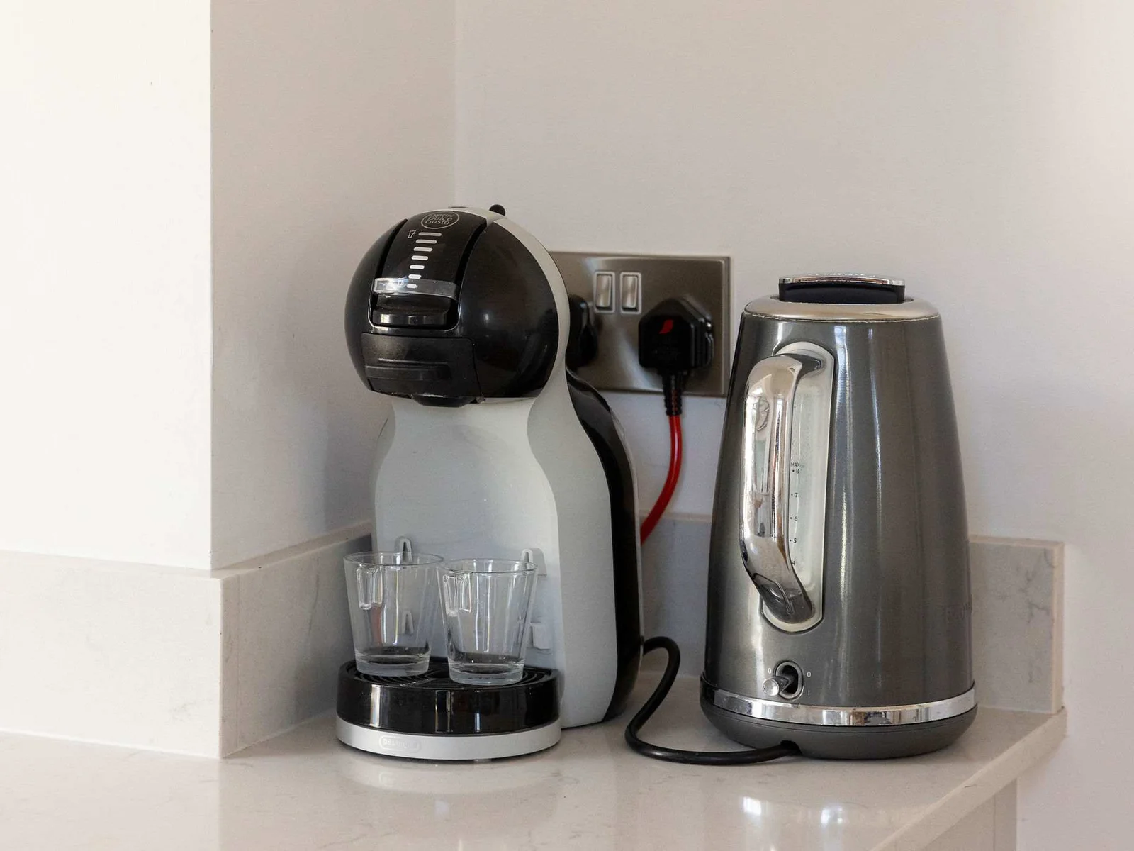 Tea or Coffee? This home offers a Nescafe Dolce Gusto coffee machine.