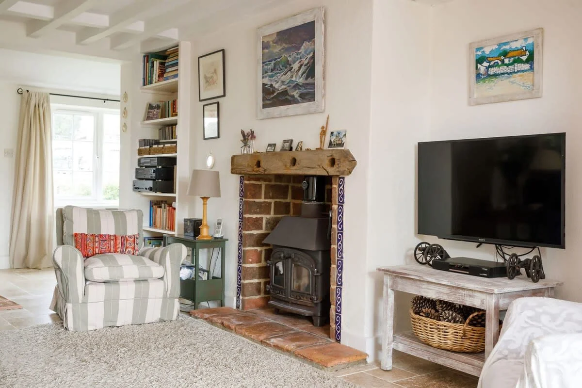 The lounge has a log burner for cosy evenings during the cooler months.