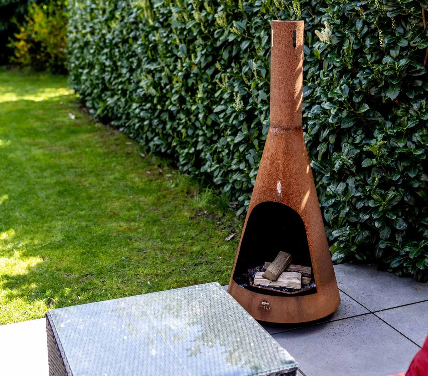 Private garden seating with outdoor fire pit, perfect for cosy evenings and relaxed gatherings.