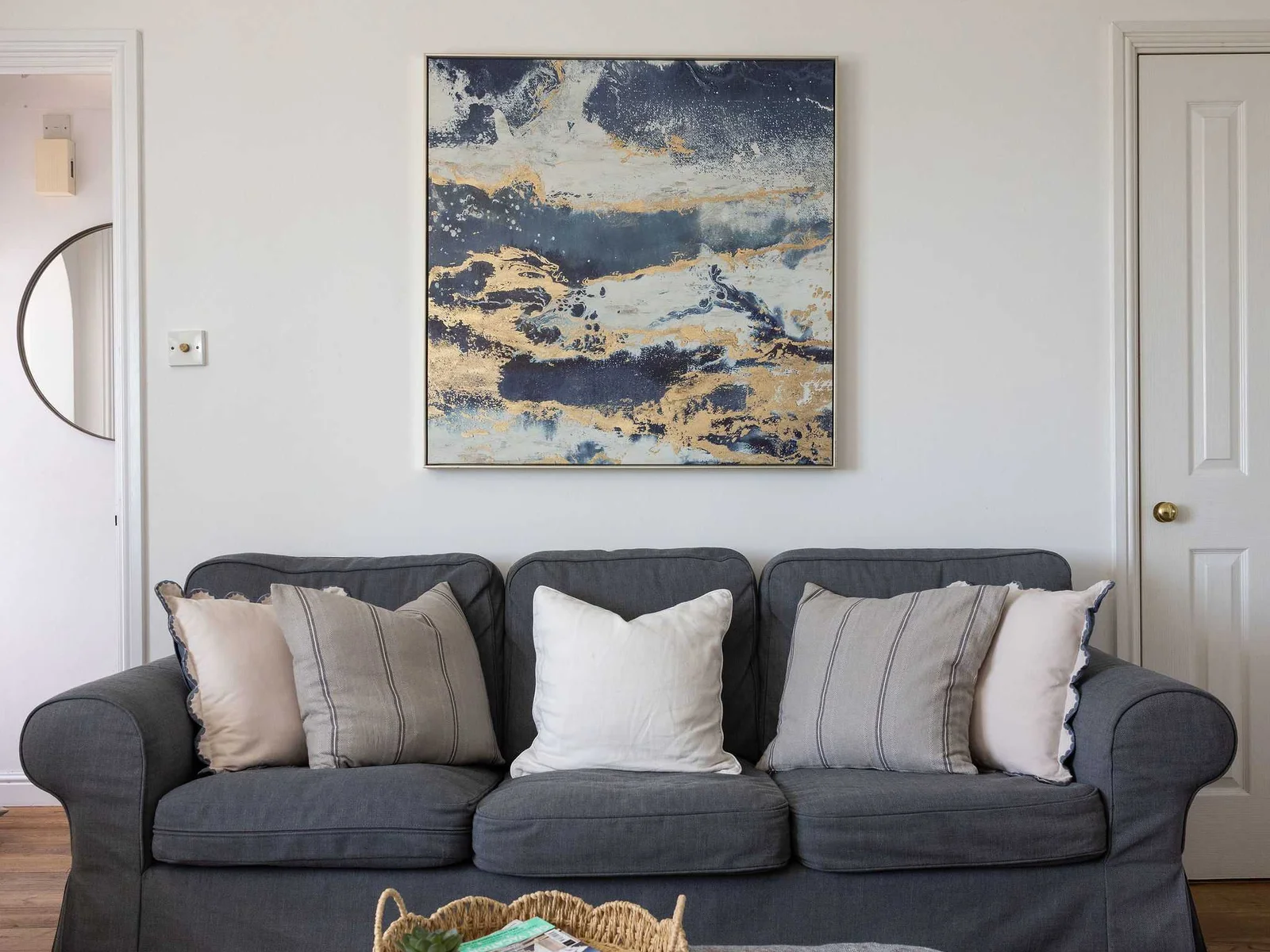 Comfortable lounge with plush seating, creating a relaxing base for your seaside holiday home.