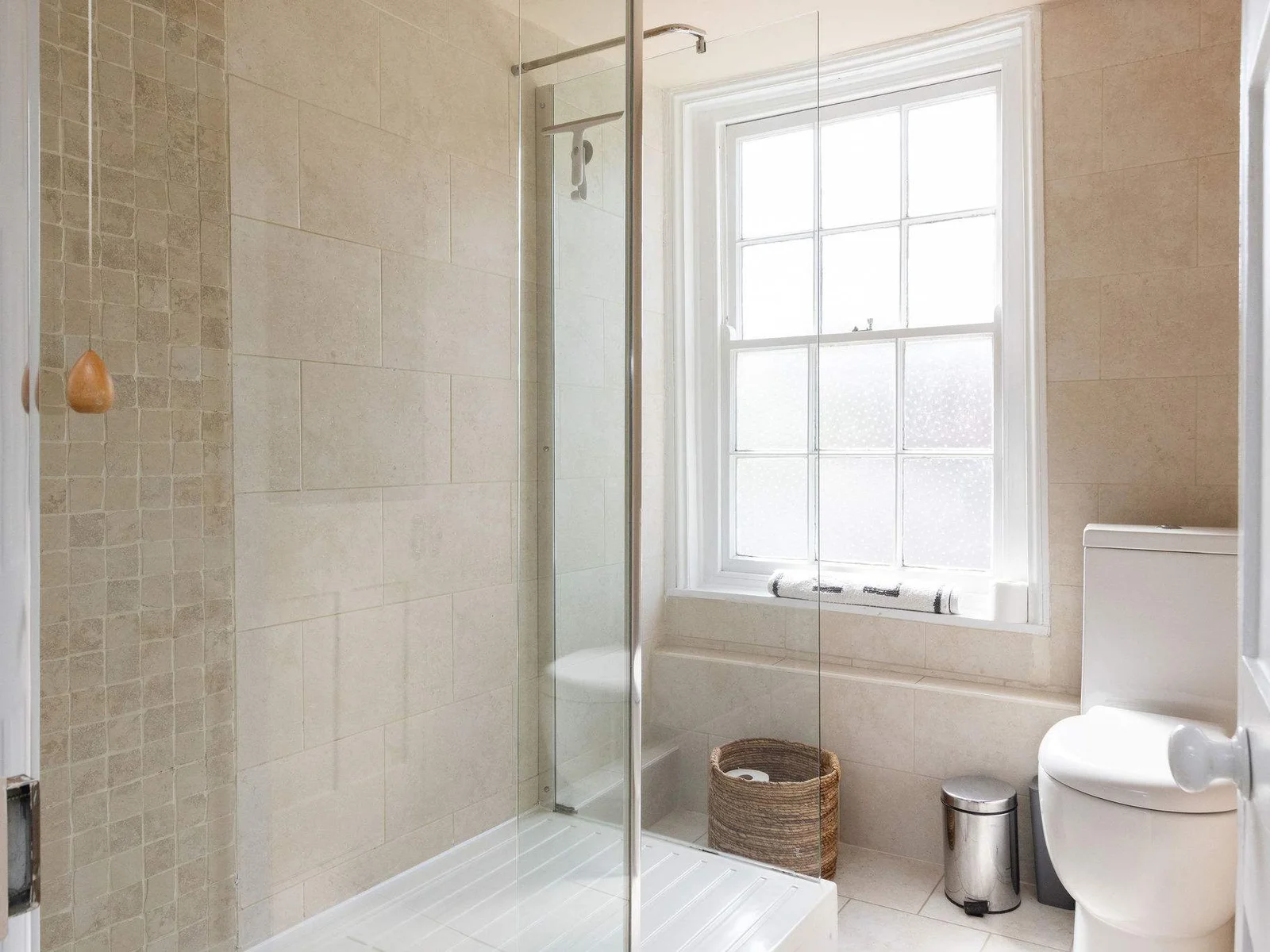 Bright family shower room with clean modern finish
