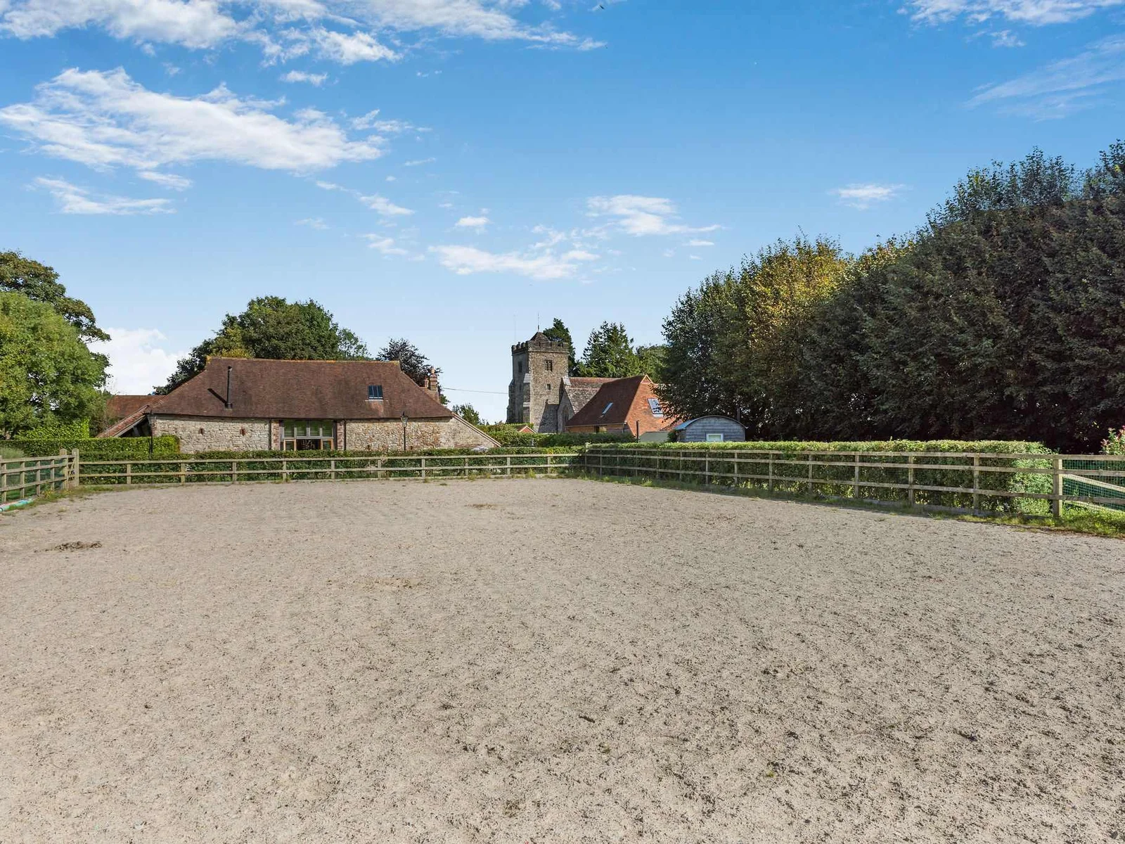 The private all-weather manège, ideal for equestrian stays