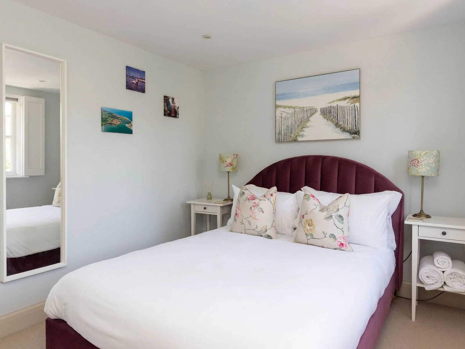 Elegant double bedroom with soft coastal tones
