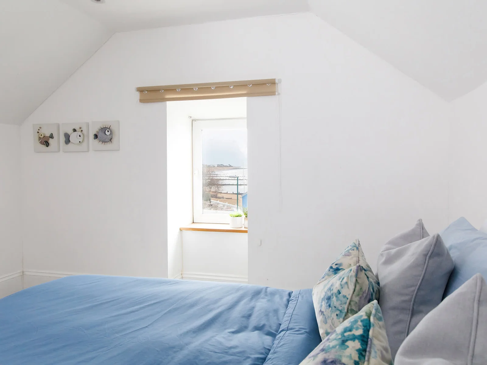 A king size bed and picturesque views.