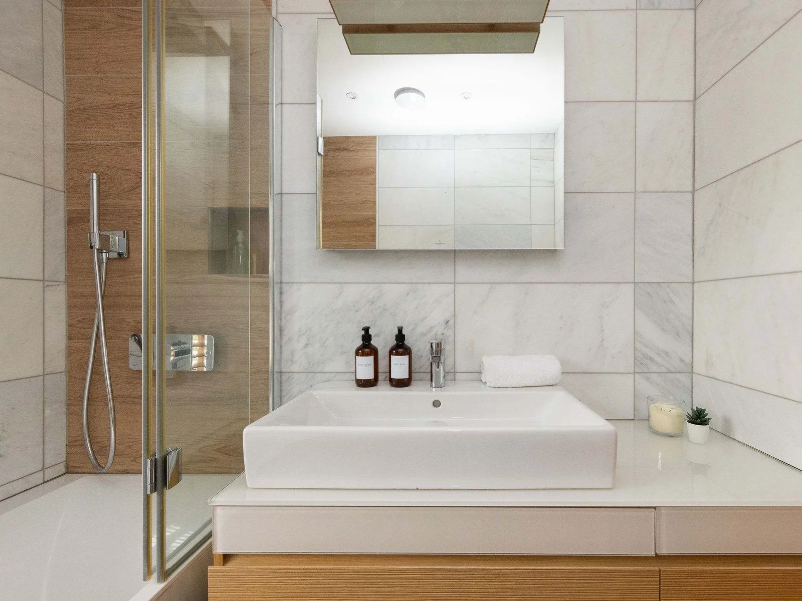 Sink with overhead mirror.