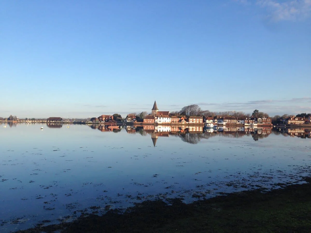 Bosham sits on the waters edge of Chichester Harbour.