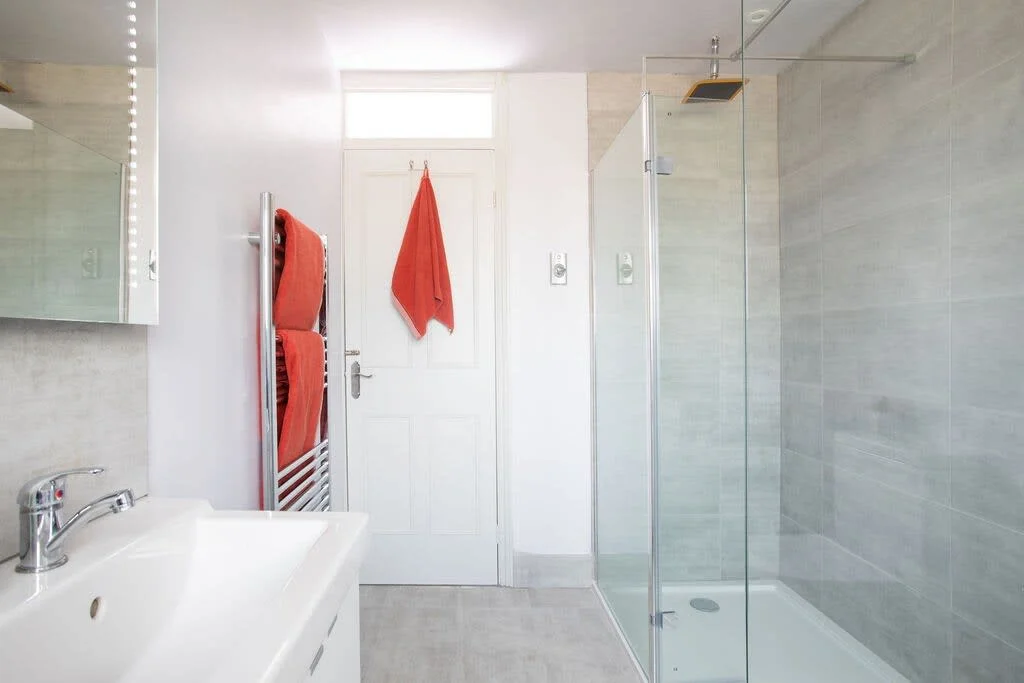Towels and toiletries for all guests in the family bathroom.