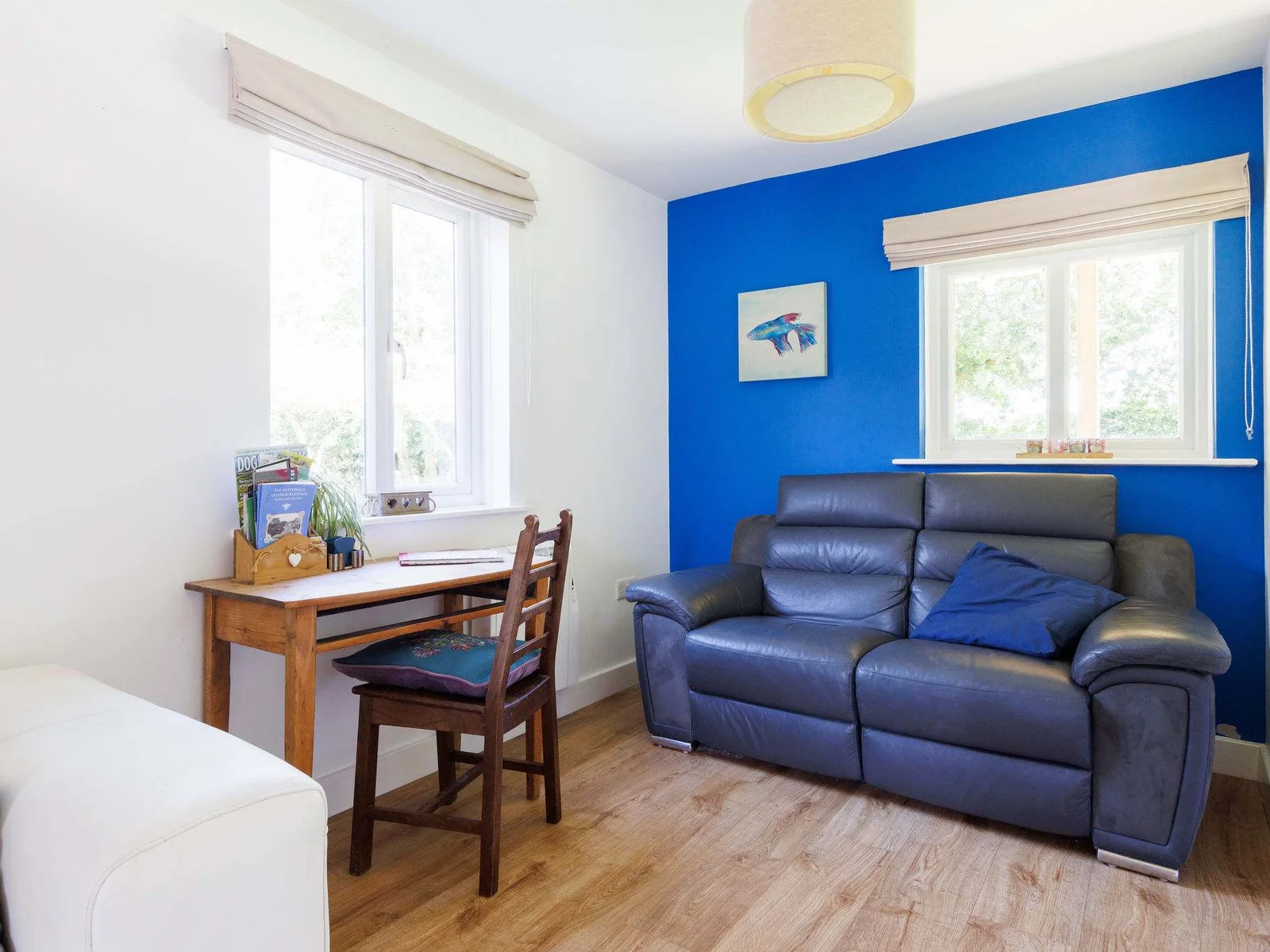 With an additional lounge area and a work desk, this home provides ample space for everyone to relax or catch up on work.
