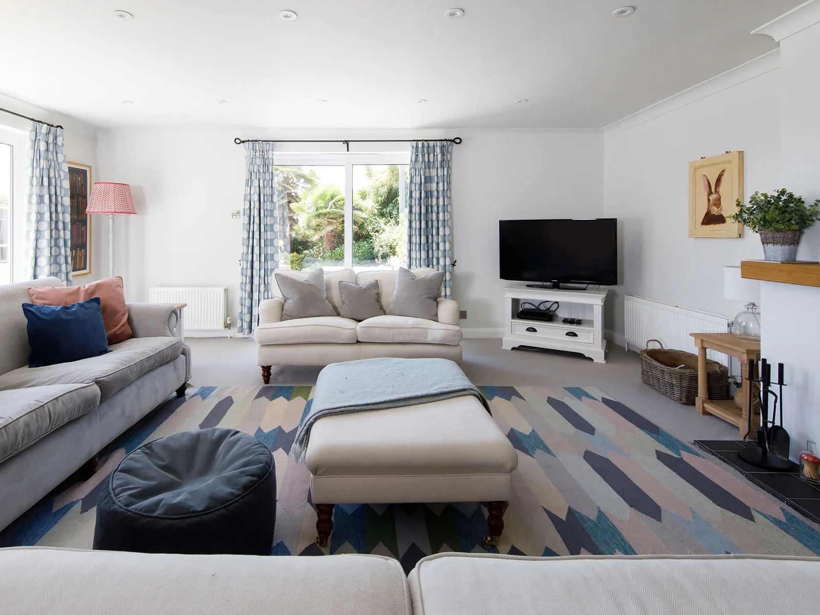 The main lounge has a wood burner and Smart TV, with DVD player and Sky.