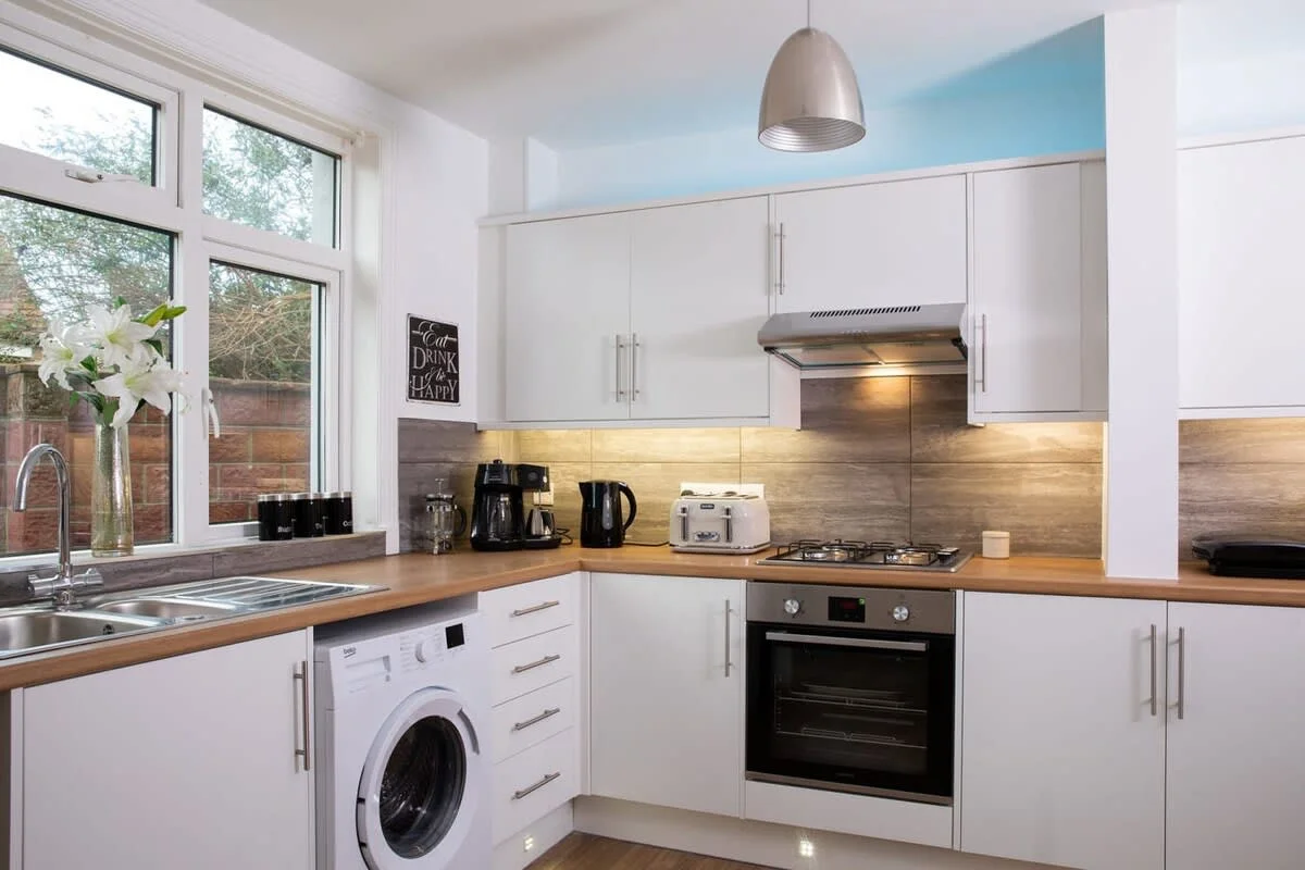 The house has a smart, modern kitchen.