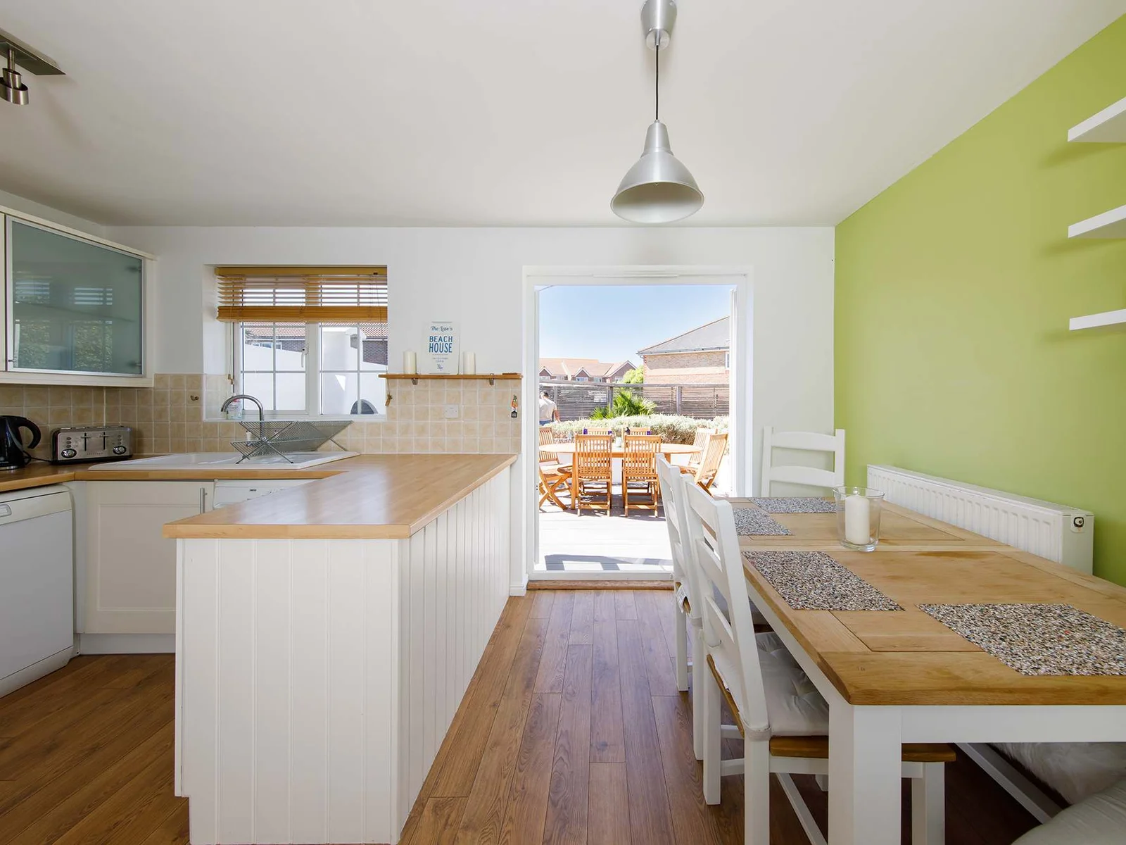 The spacious kitchen diner opens out to the beautiful garden.