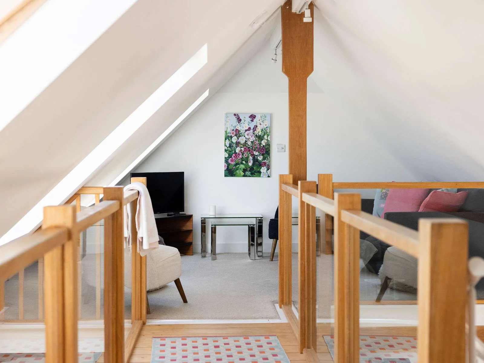 Discover unique charm in this beautiful loft living space at Sheepwash Barn.