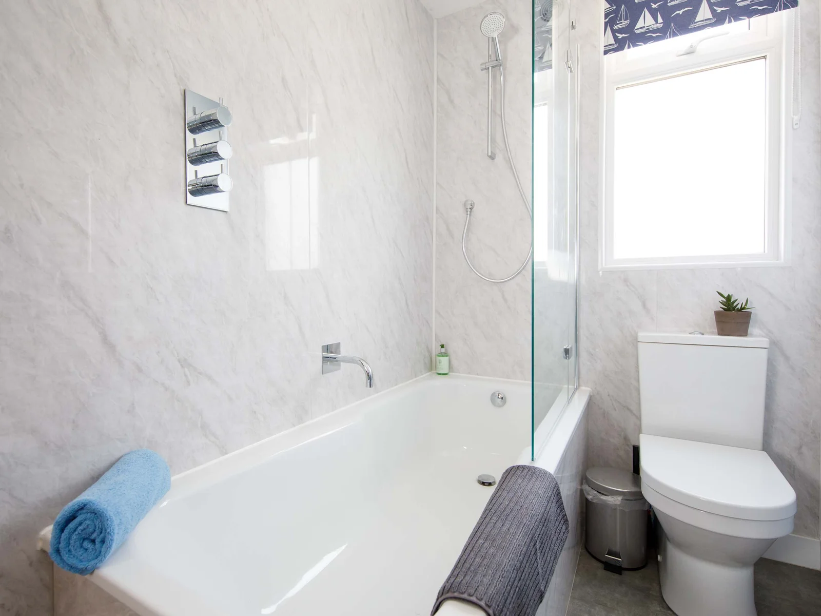 Full-size bathtub in the luxurious bathroom