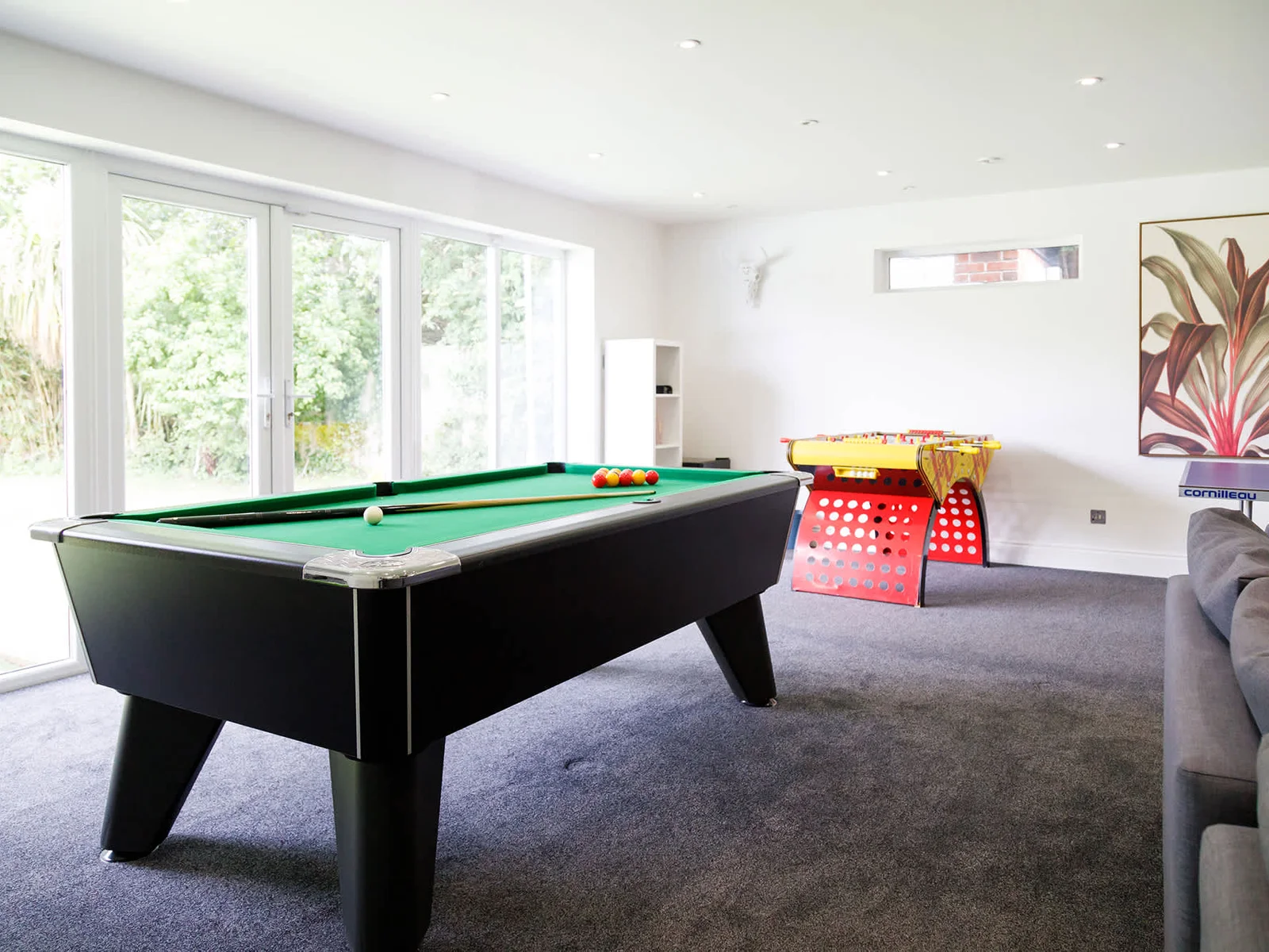 The games room has a pool table and fussball.