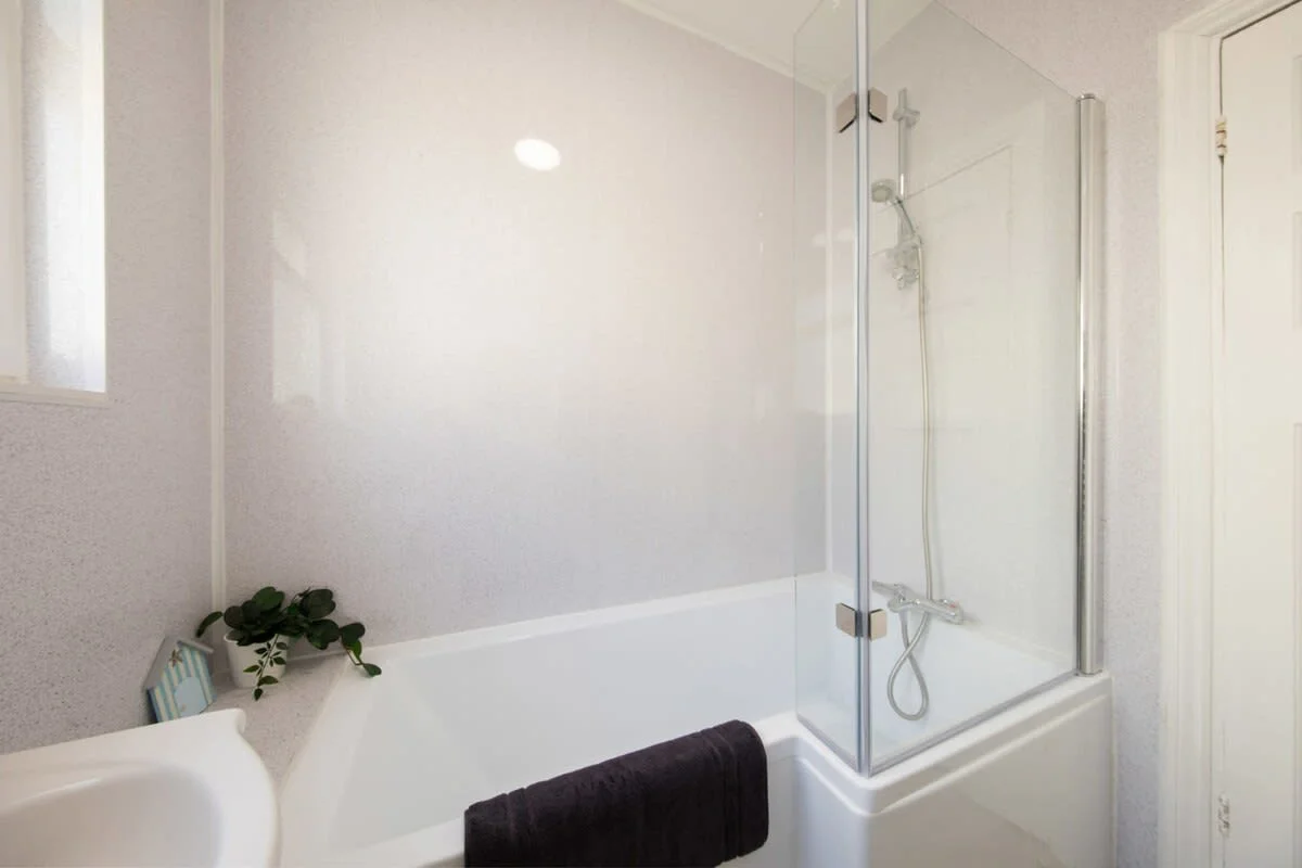 Take a relaxing bath in the family bathroom after a day spent seeing the sights
