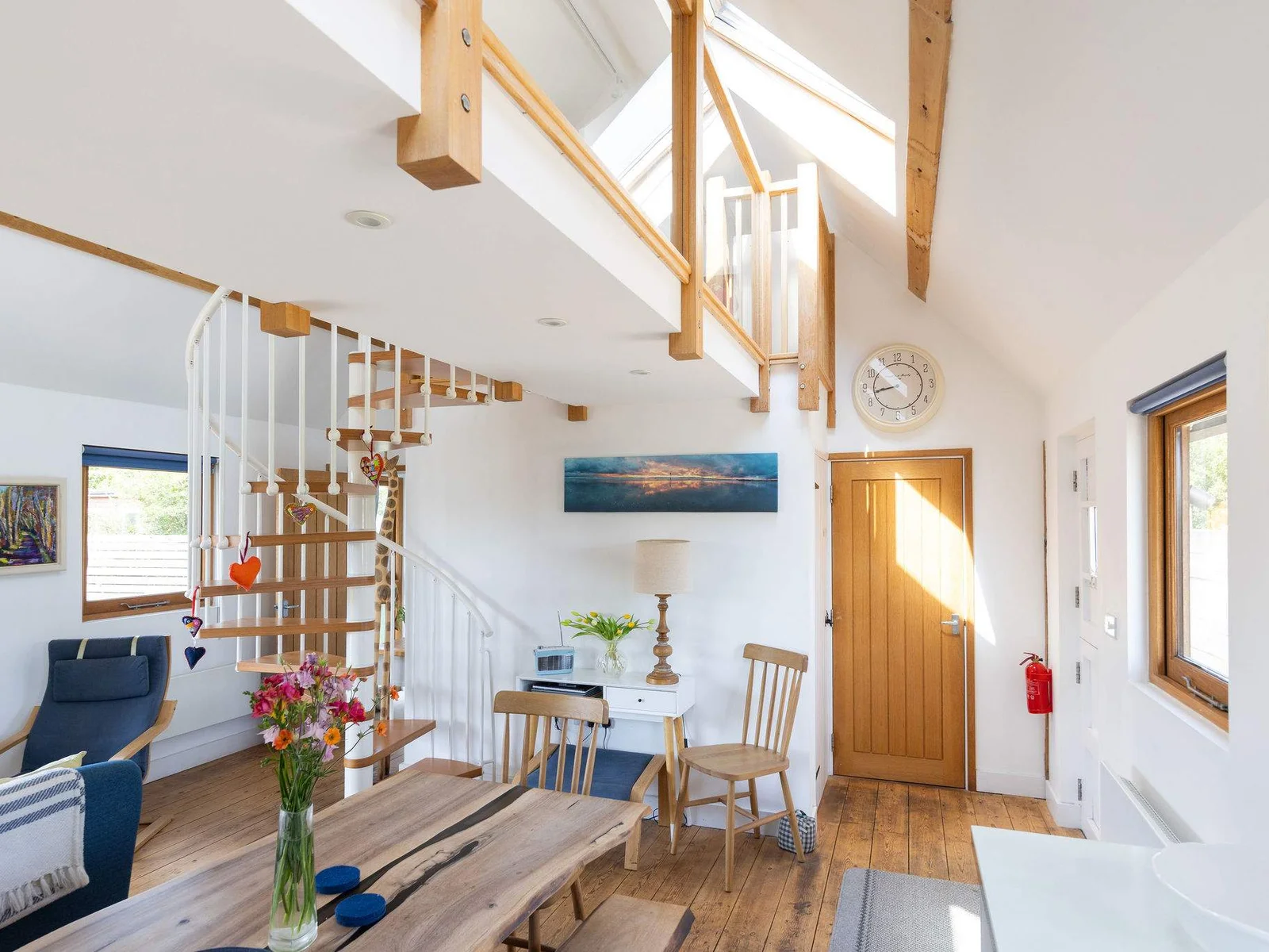 Enjoy modern rustic charm and an abundance of natural light in the main living space.