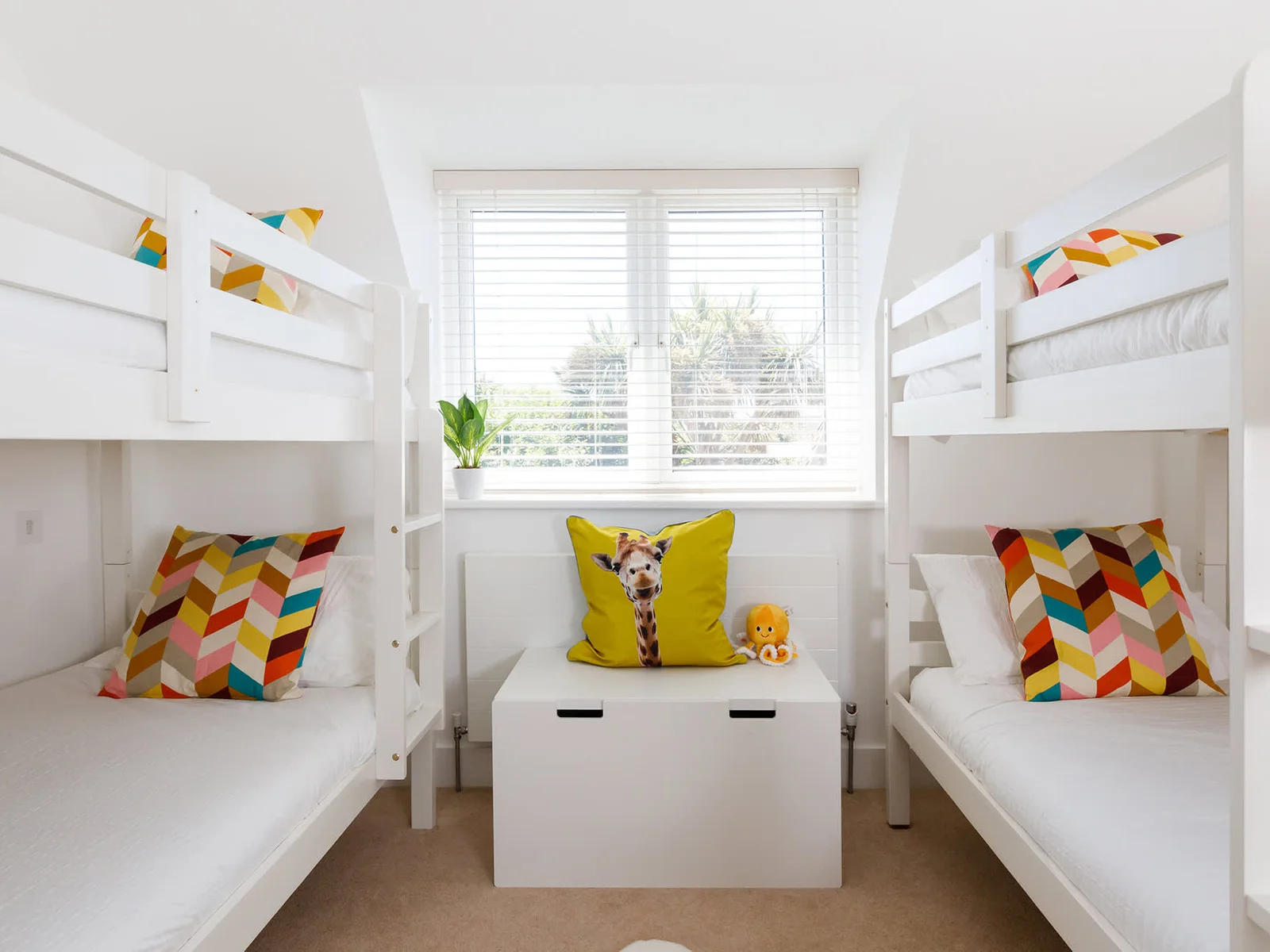 The home is designed for families, best visible in the two bunk bedrooms
