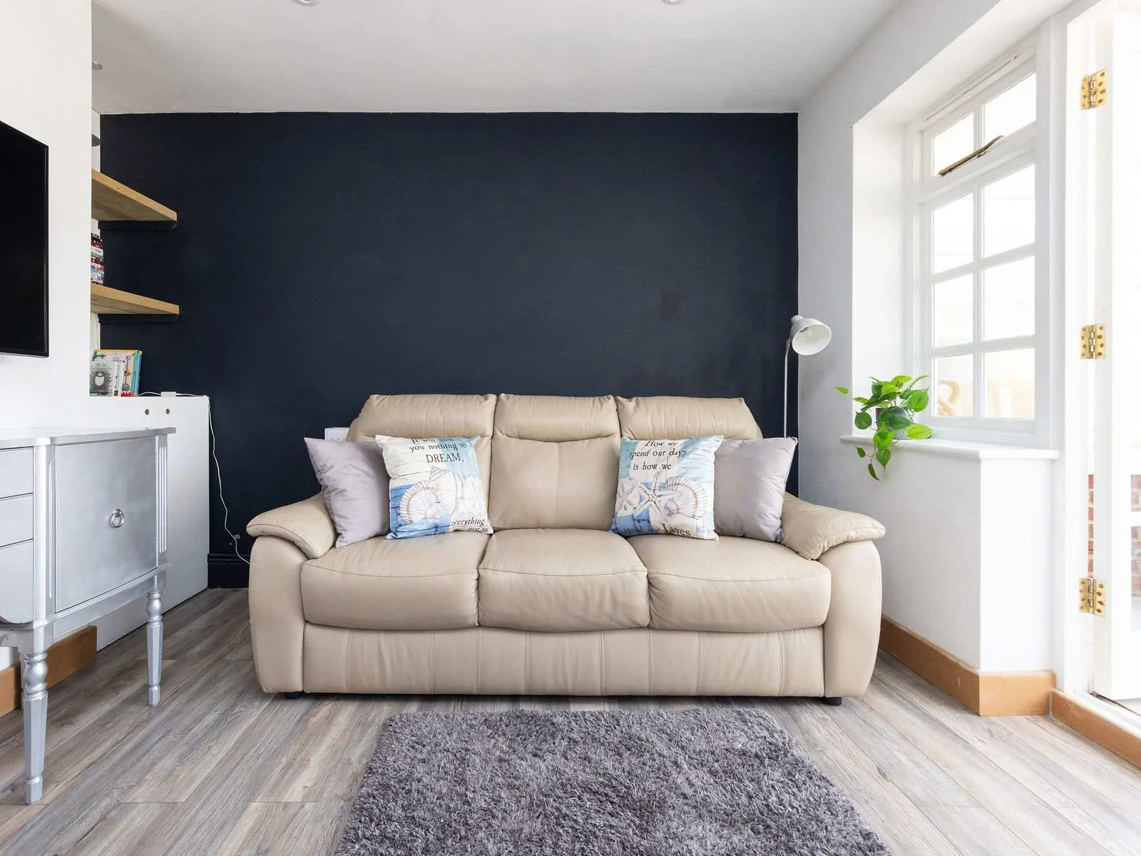 Stylish seating with smart TV and calming tones