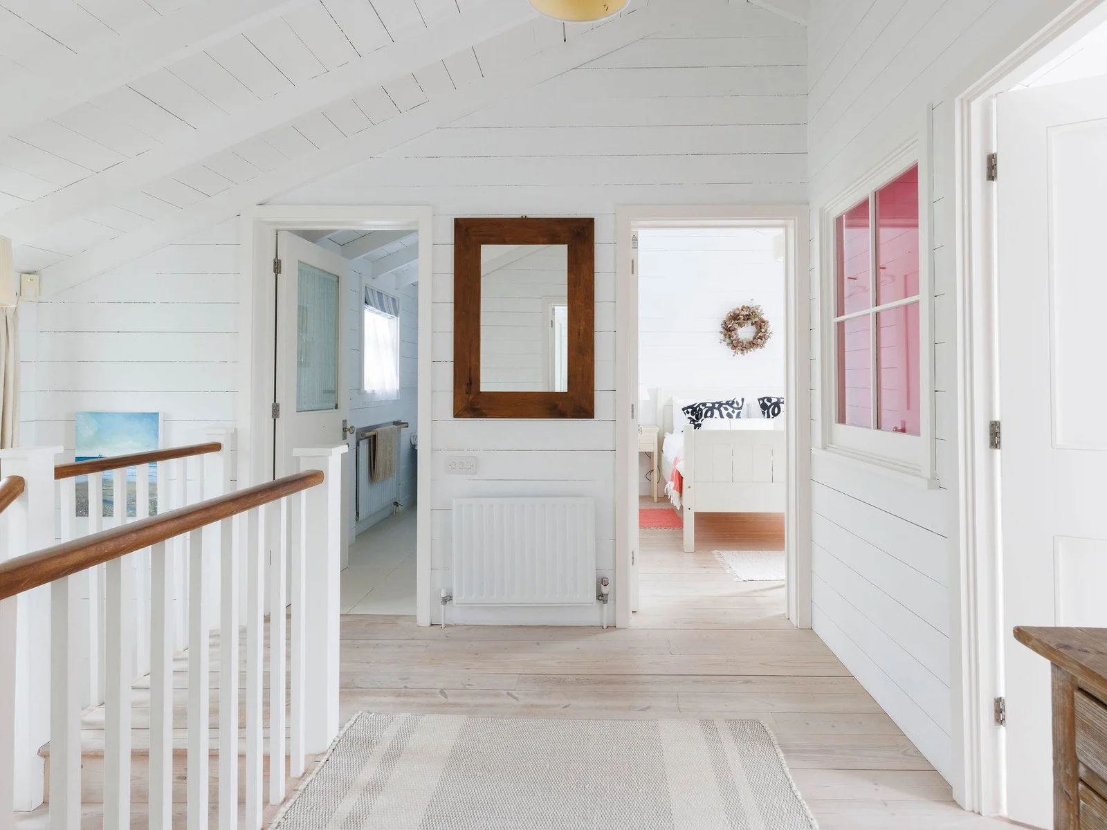 The hallway showing the family bathroom and bedroom 2