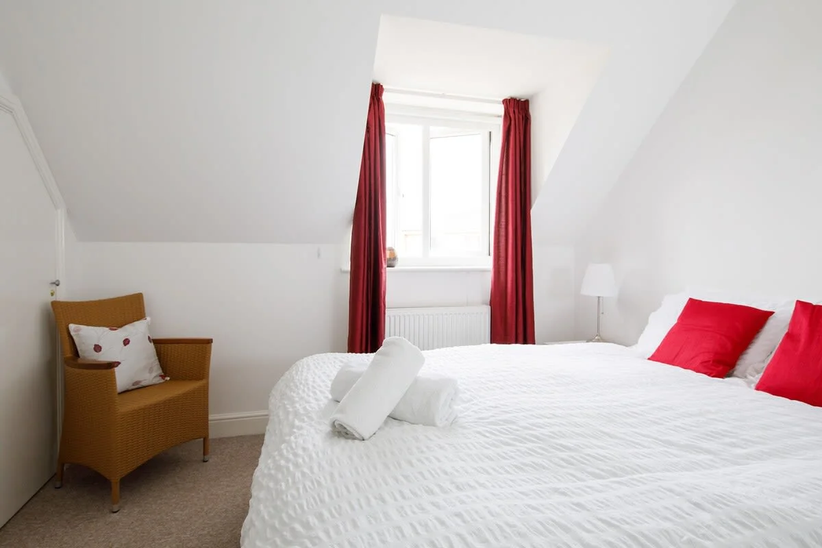The bedroom is clean, bright and spacious.
