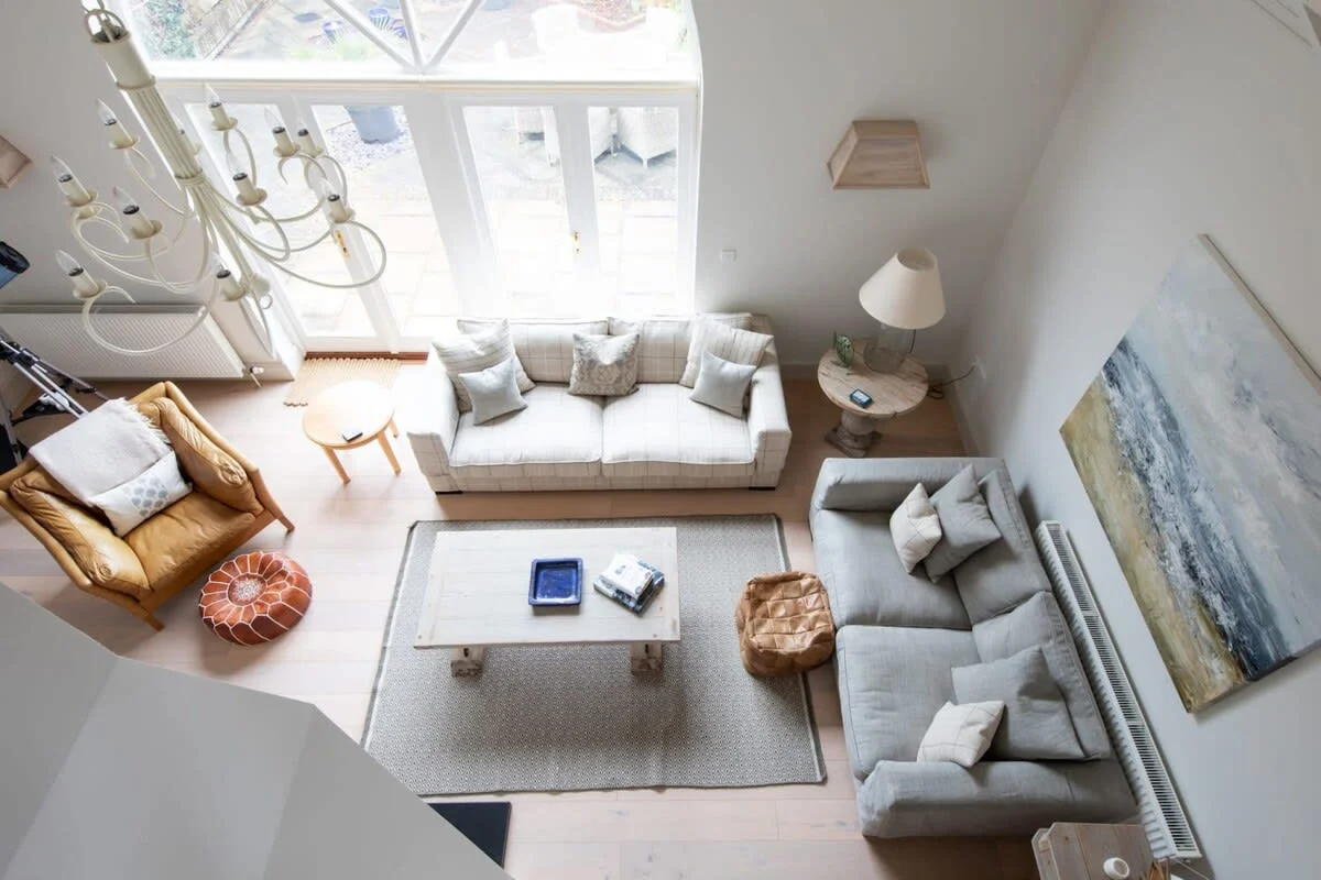 A view of the sitting room and courtyard from galleried study.