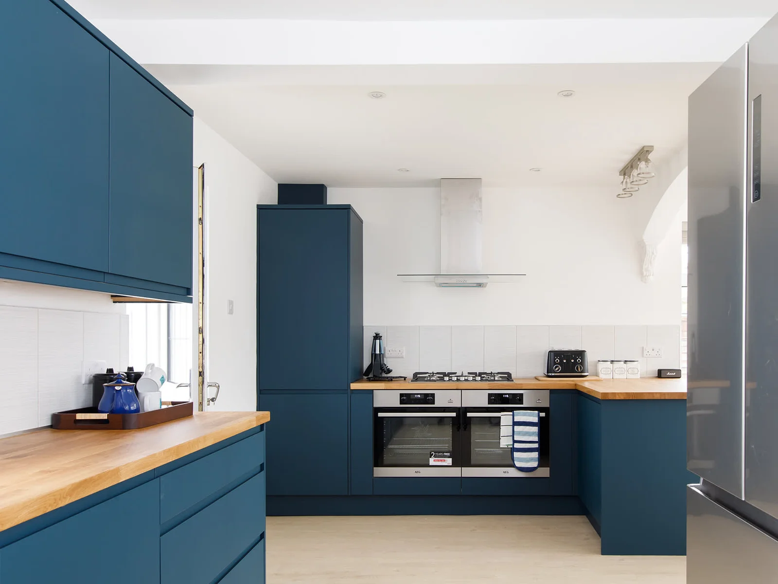 The kitchen has spacious countertops, giving plenty of room to cook up a storm or prepare beach picnics.