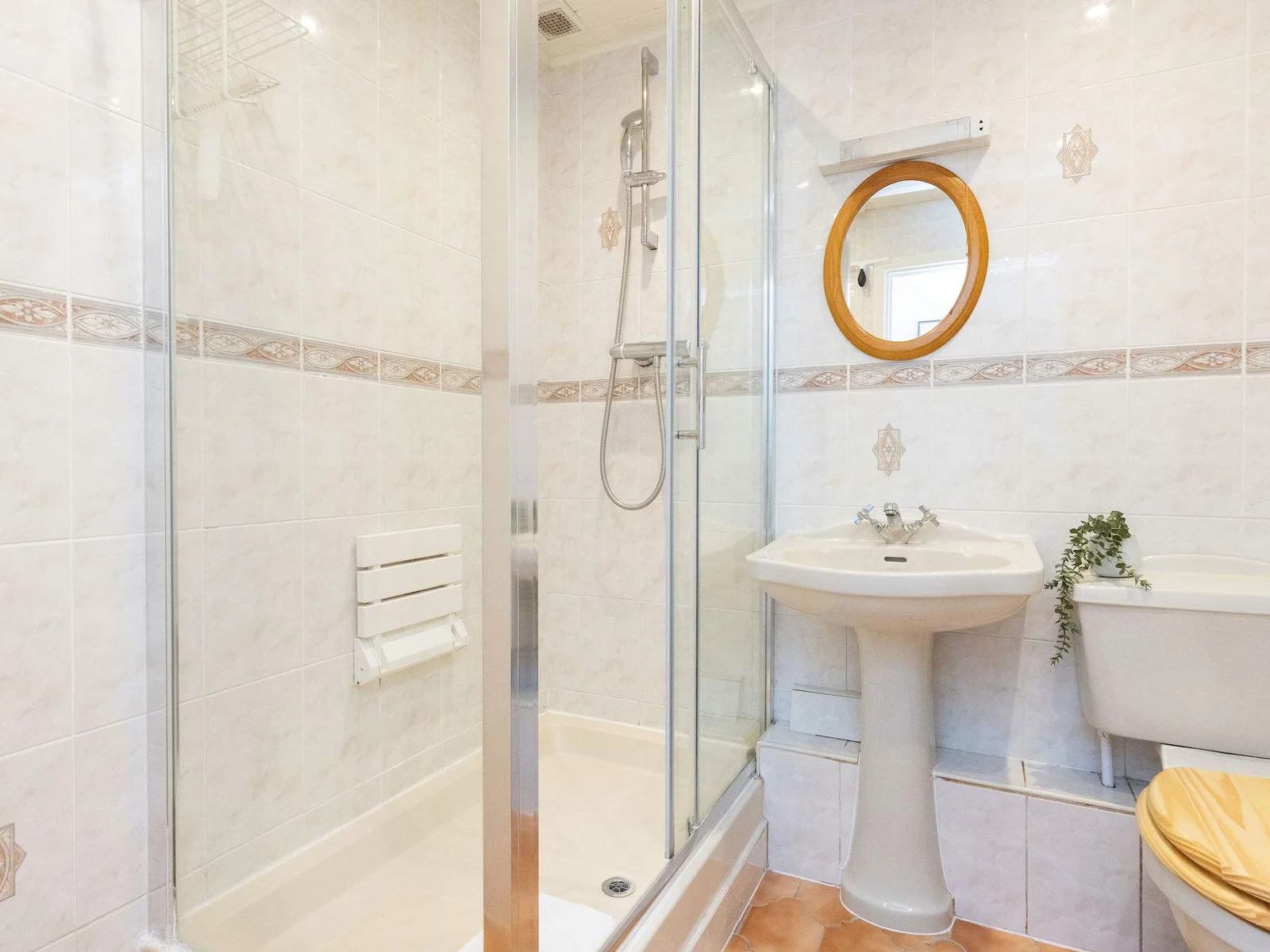 The home has two bathrooms - one ensuite and a family shower room (pictured).