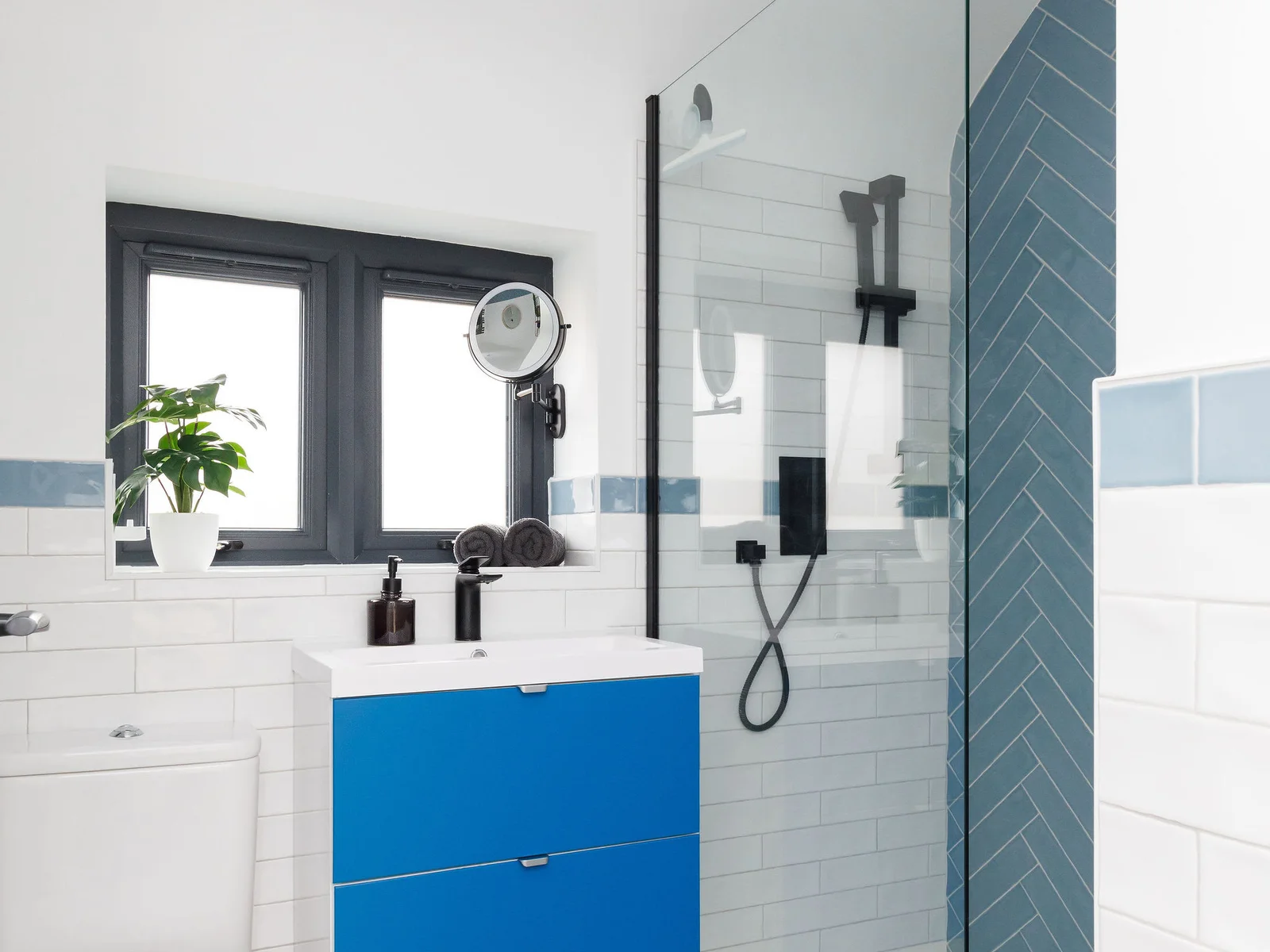 Enjoy the luxury of a large walk-in shower in the family bathroom.