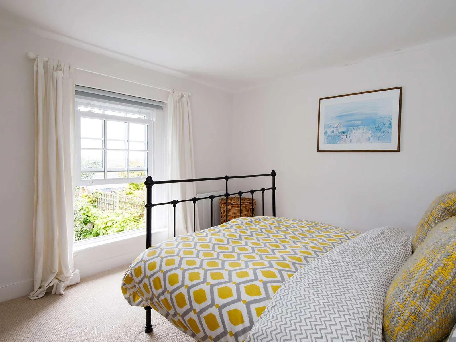 This beautiful bedroom has lovely views over Sidlesham quay