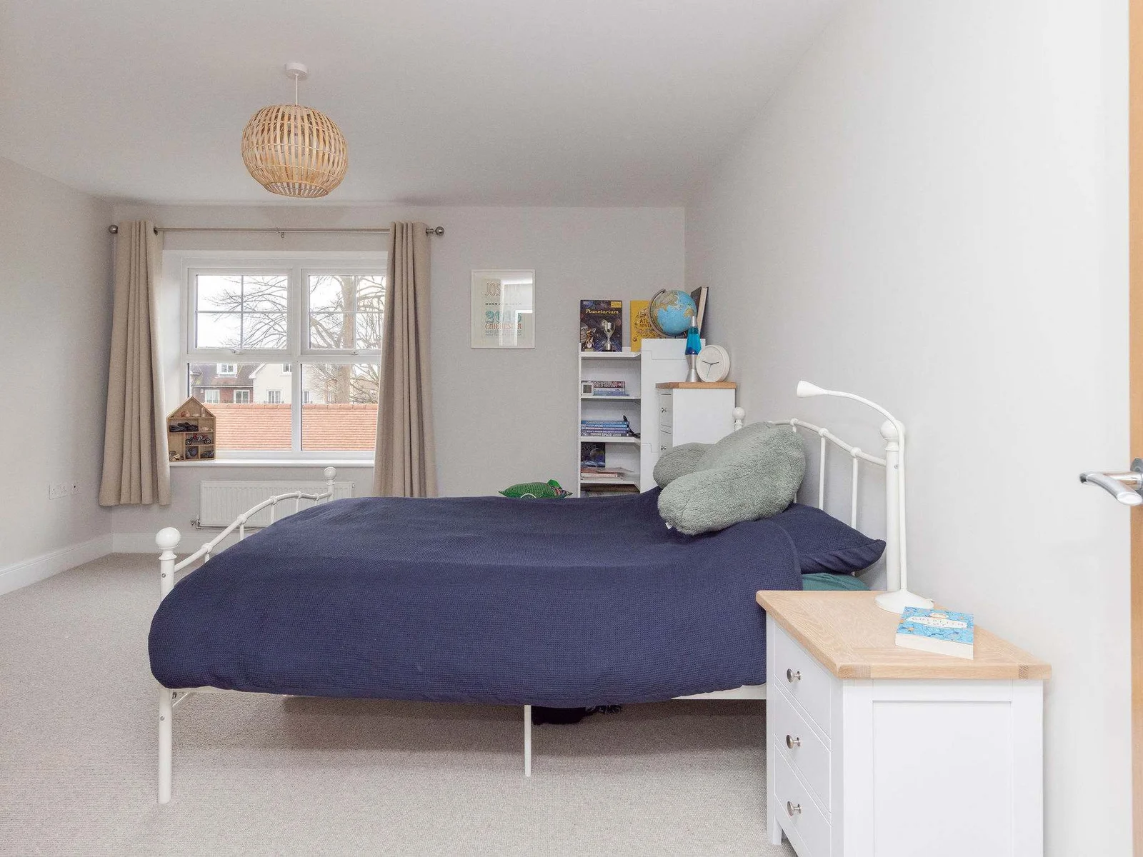 A double bedroom with quality linen and cushions for a good nights rest.
