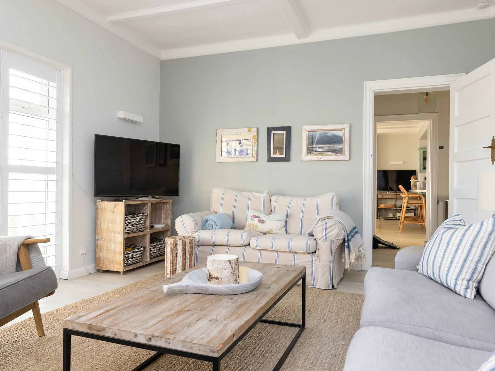 This family lounge with large TV is the perfect space for all to enjoy!