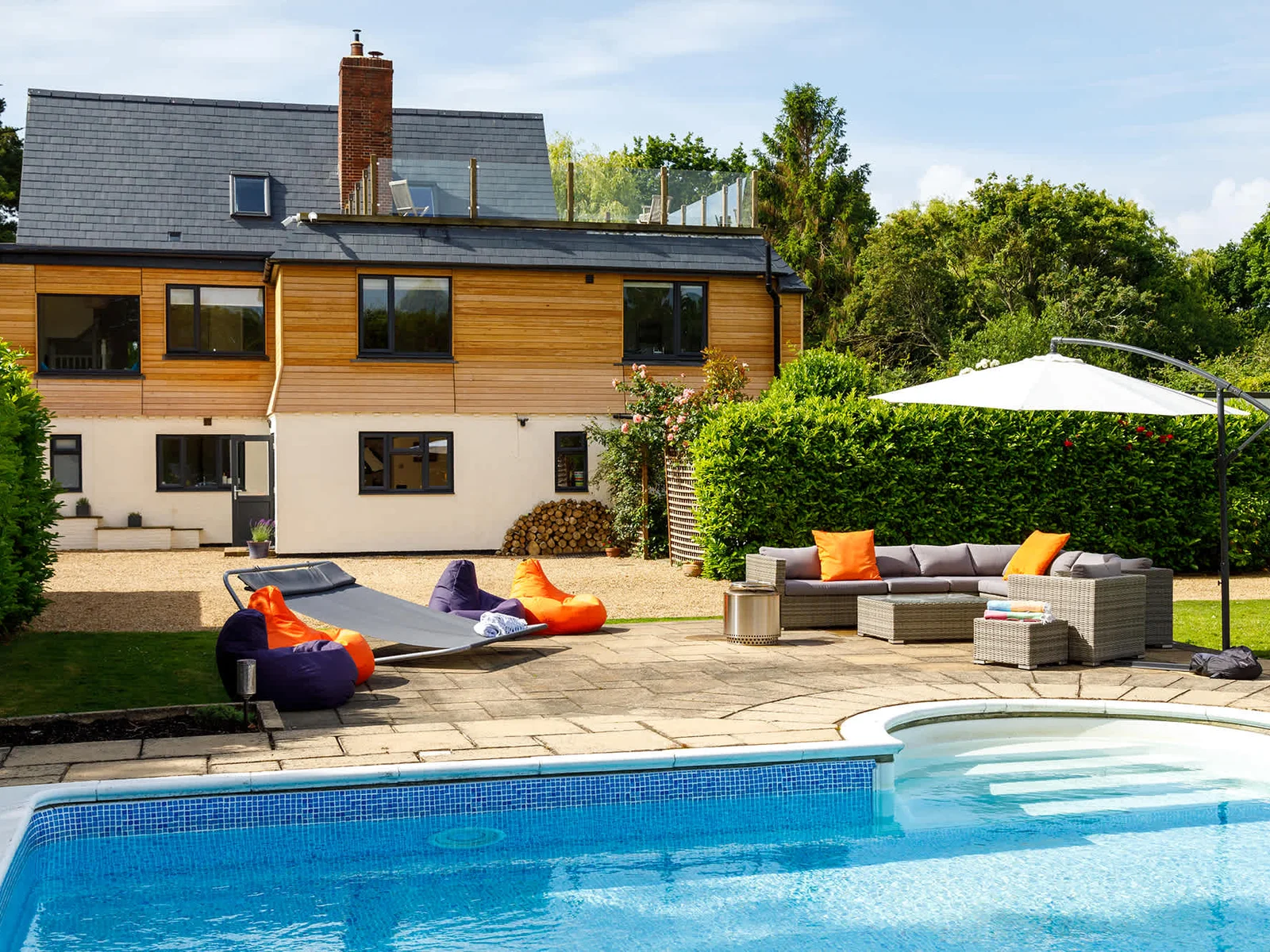 Relax by the pool on the sofas or bean bags.