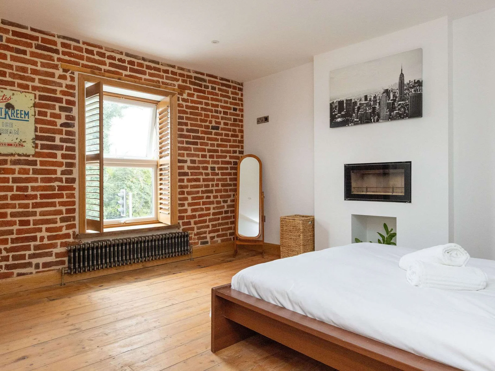Bedroom 1- Open up the shutters to welcome in the daylight.