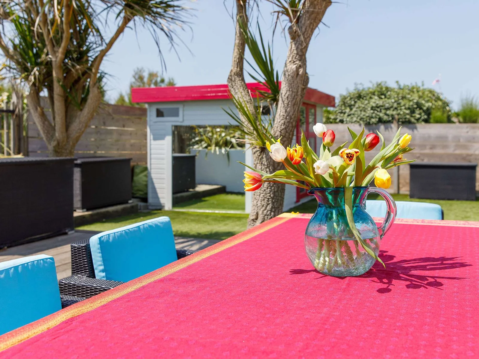 Pops of colour give the garden a vibrant and tropical feel. Cocktails anyone?!