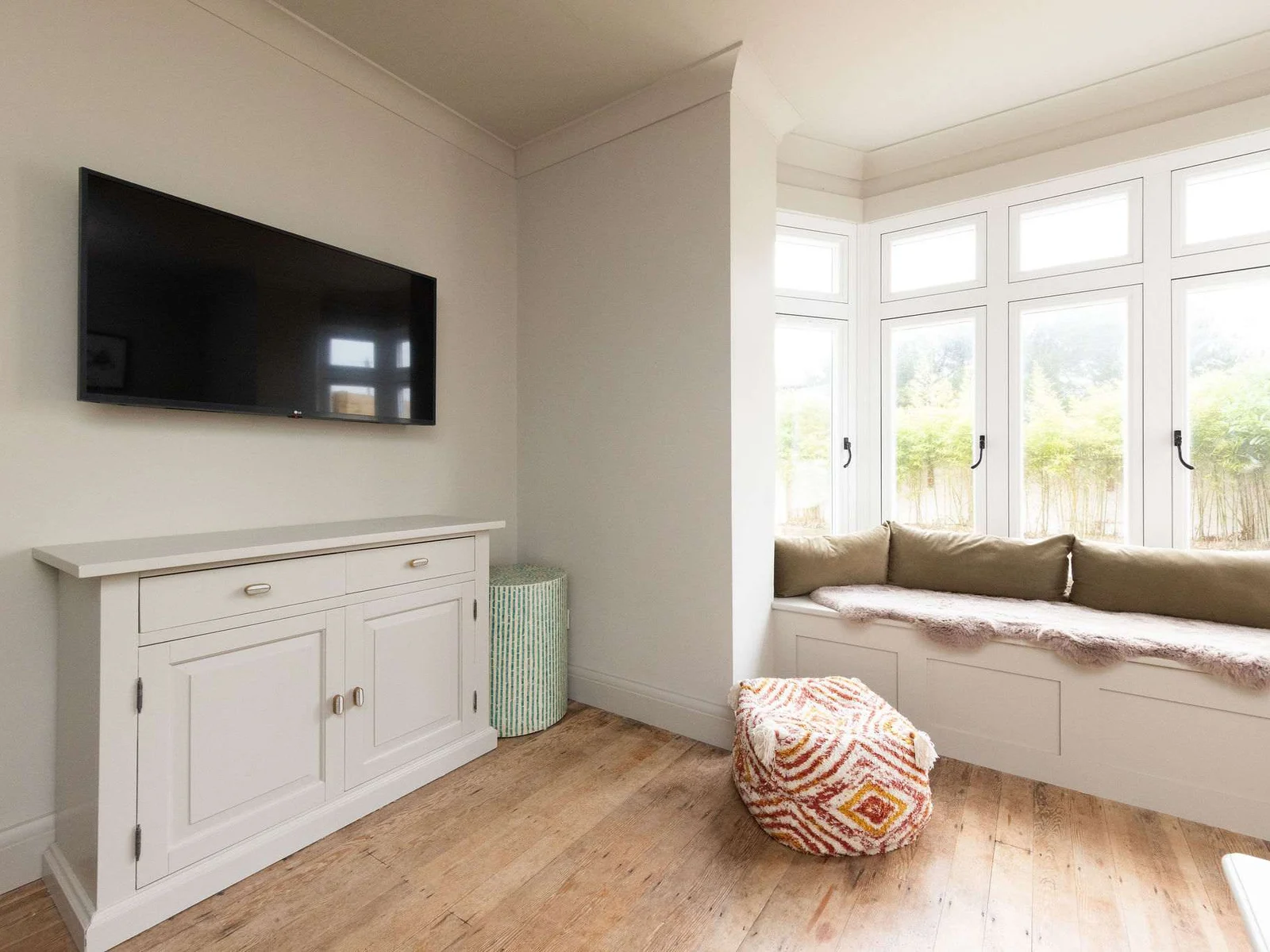 The perfect spot for a movie night, with a Smart TV and a sunny window seat.