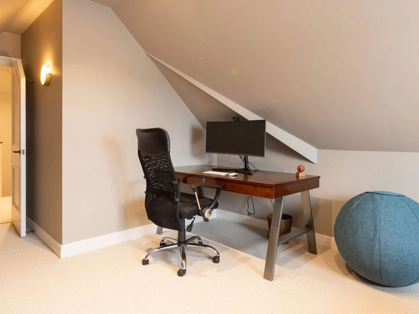 Dedicated office space with desk and monitor