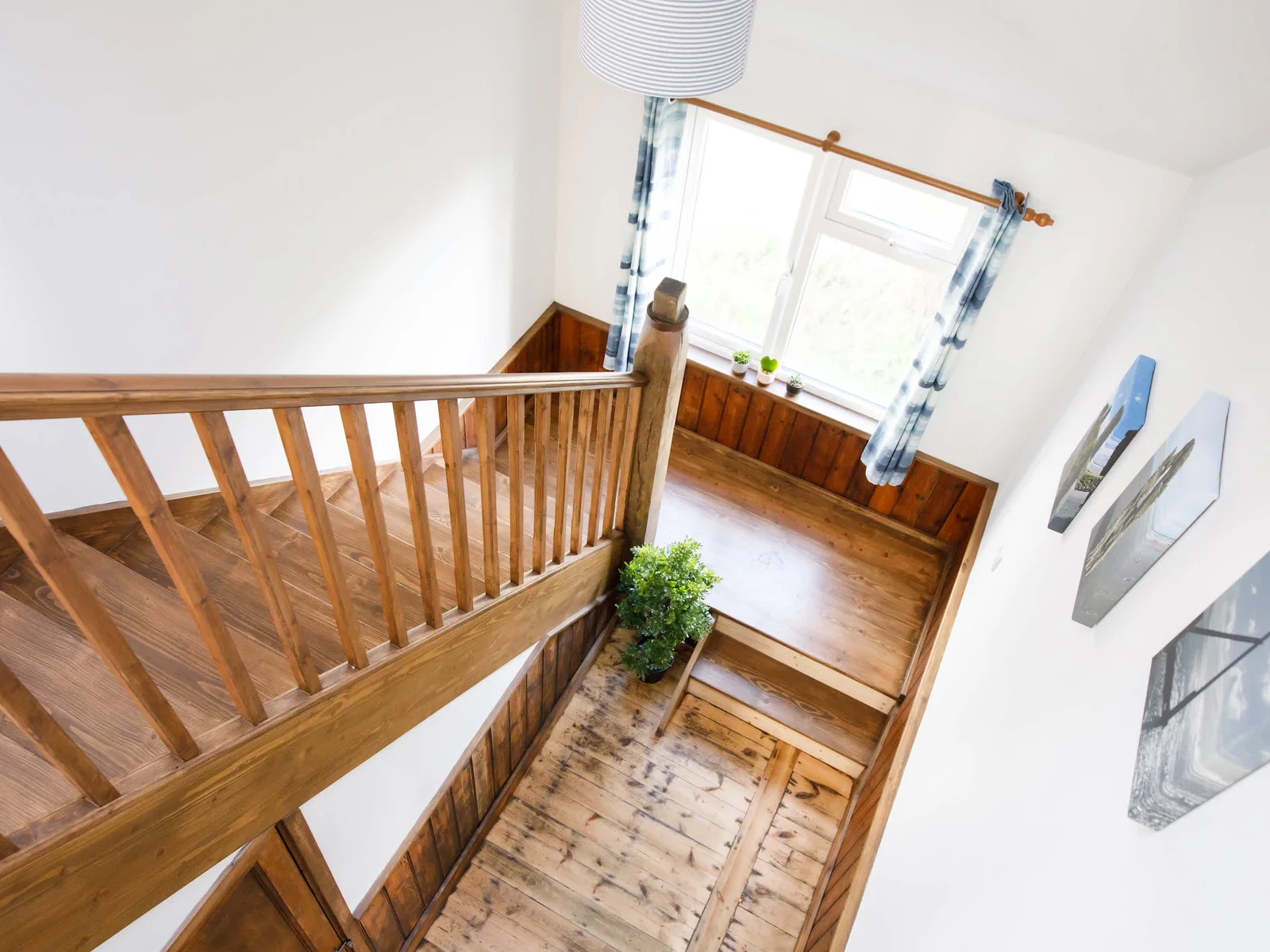 The stunning wooden staircase takes you to the first floor