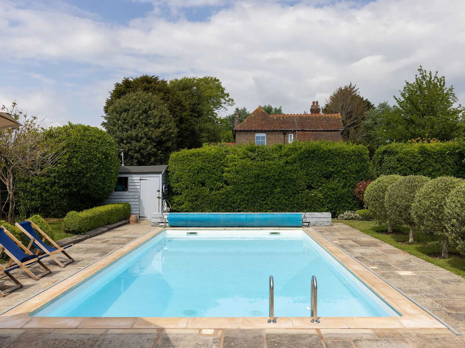 Heated swimming pool with plenty of space to unwind.