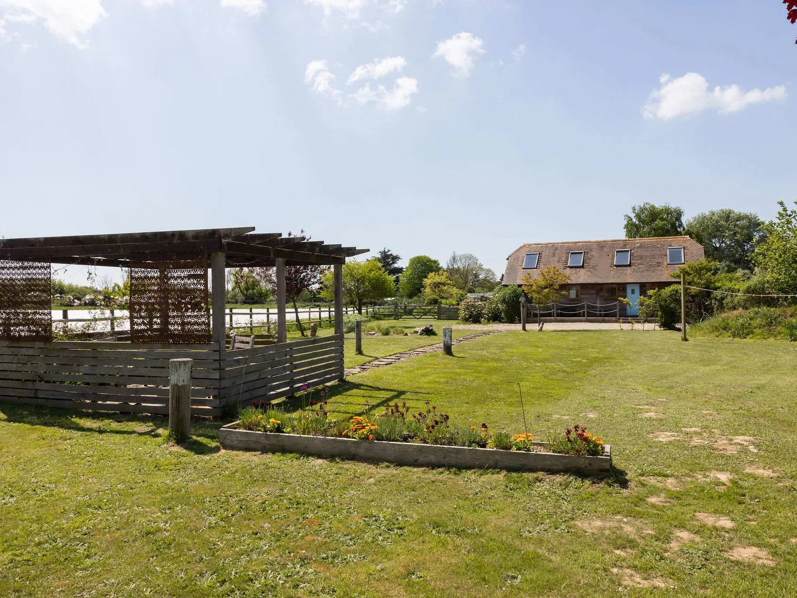 This property offers a wonderful outdoor space with comfortable seating to enjoy the serene surroundings.