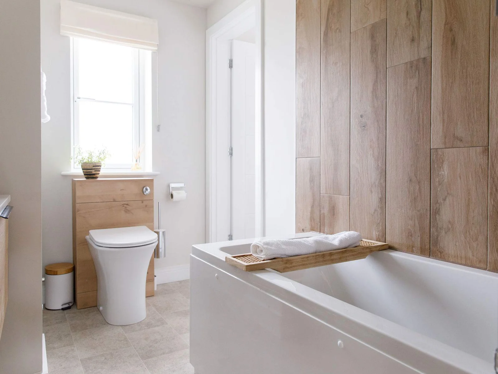 The downstairs bathroom with Jack and Jill door to the Bedroom and one to the Hallway