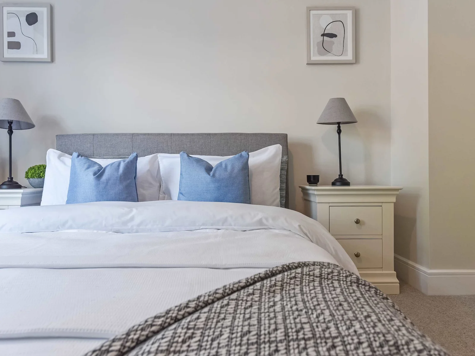 Each bedroom has bedside tables and reading lamps for your comfort.