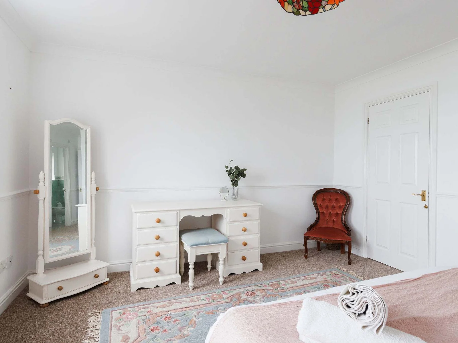 The master bedroom has a vanity table, mirror and draws, with lots of space to get ready in the morning.