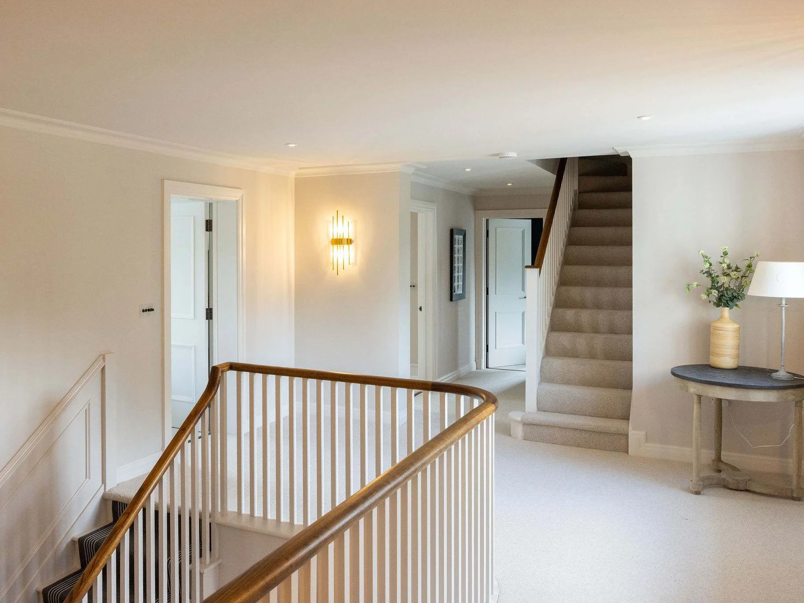 Spacious landing leading to five stylish bedrooms
