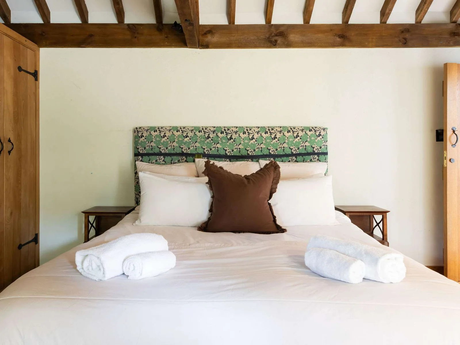 Sink into crisp linen and enjoy a quiet night beneath the original timber beams
