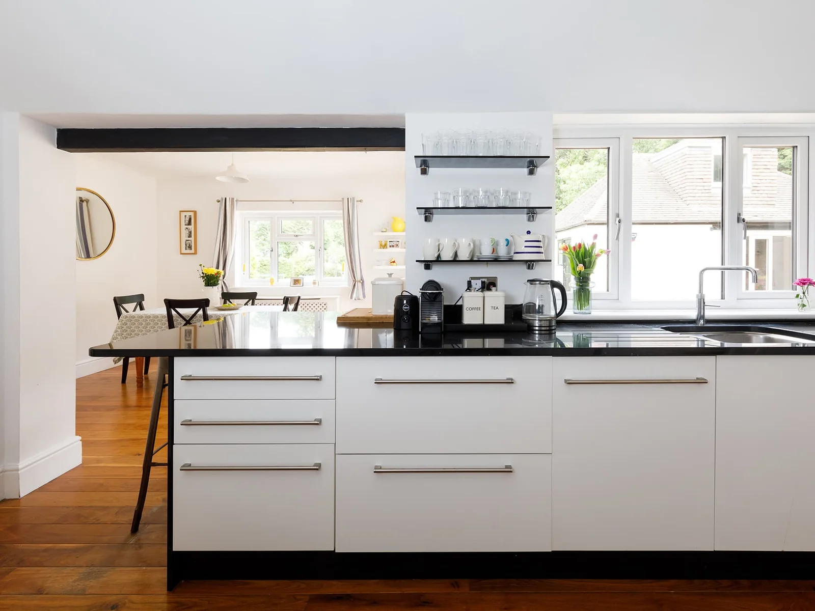 Attached to the kitchen is a pretty breakfast room.