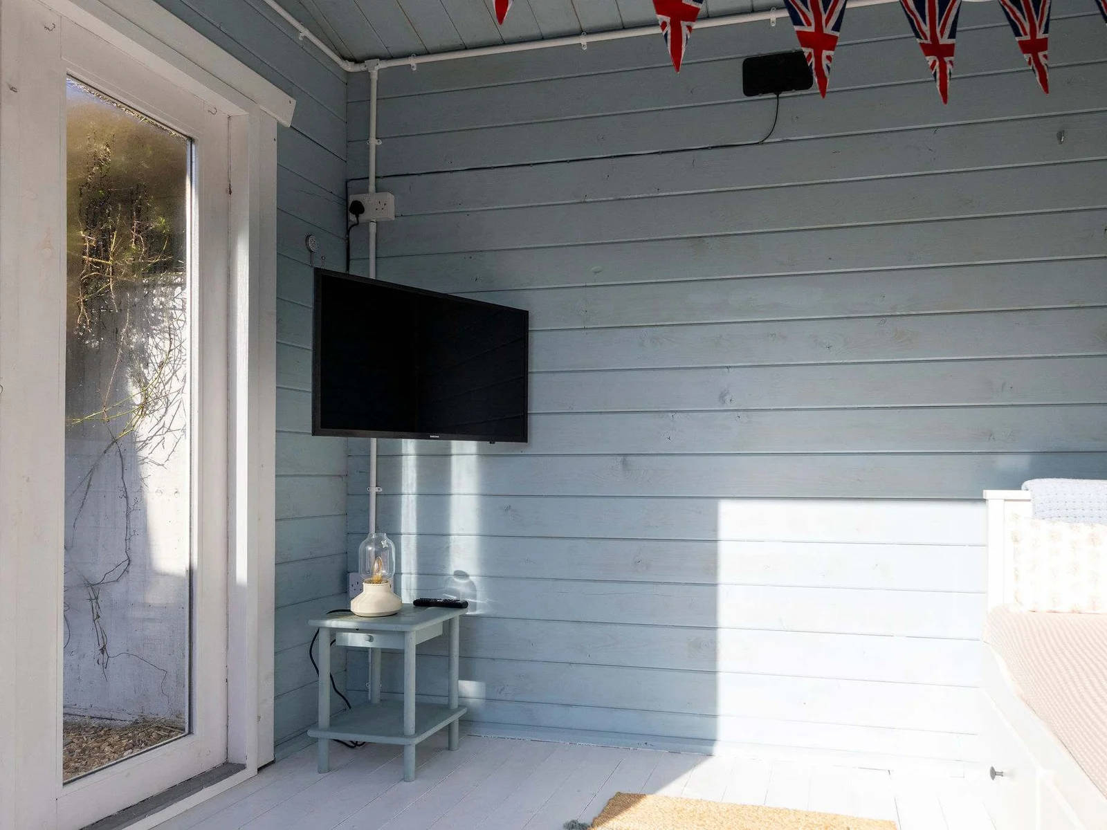 Outdoor TV for entertainment.