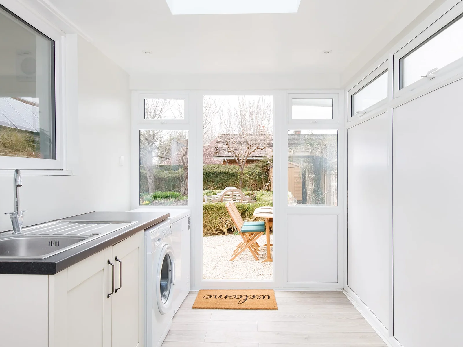 There is a handy utility room to keep on top of holiday washing and organise beach bags.